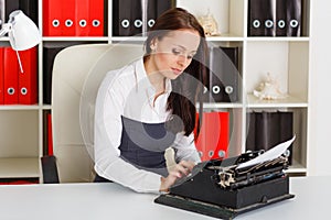 Young woman with typewriter.