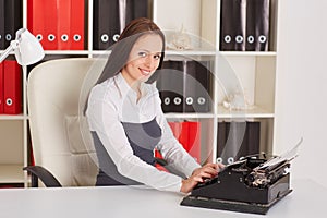 Young woman with typewriter.