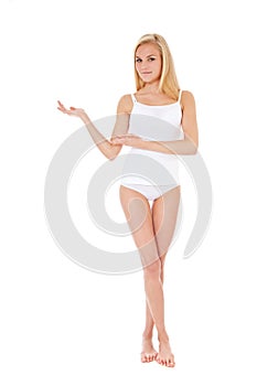 Young woman in underwear pointing to the side