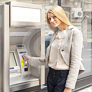 Young Woman use Bank ATM