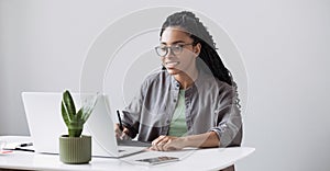 Young woman using laptop computer at office panoramic banner, Student girl working at home, e-learning and business concept