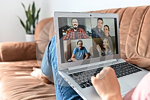 Young woman using laptop for video call, zoom