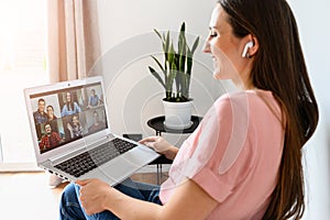 A young woman using laptop for video call, zoom