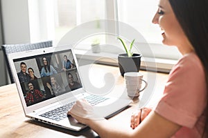 A young woman using laptop for video call, zoom