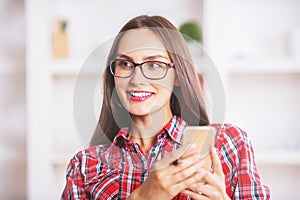 Young woman using phone