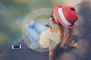 Young woman using a smart phone photo