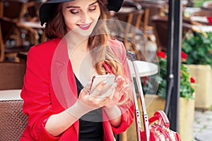 Young woman is using smartphone