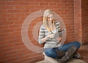 Young woman using tablet computer