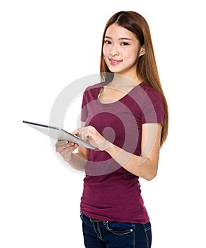 Young woman using tablet computer