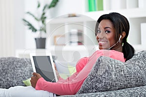 Young woman using tablet computer