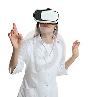 Young woman using virtual reality headset on white background