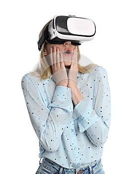 Young woman using virtual reality headset on white background