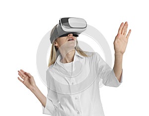 Young woman using virtual reality headset on white background