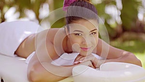 Young woman on vacation having a spa treatment