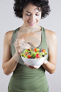 Young woman & vegetable salad