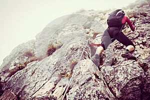 Young woman on via ferrata