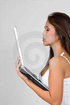 Young Woman Viewing Laptop