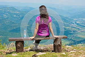 Young woman at the viewpoint