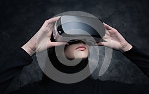 Young woman with virtual reality headset