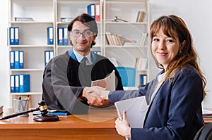 The young woman visiting male lawyer