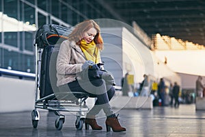 Young woman waiting at airport