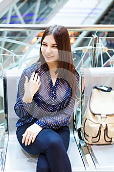 Young woman waiting for departure in international airport