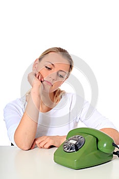 Young woman waiting for phone call