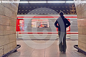 Young woman waiting for the subway train