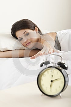 Young woman waking up