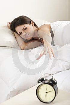 Young woman waking up