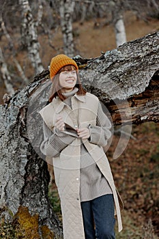 young woman walk outdoors autumn weather mountains life style