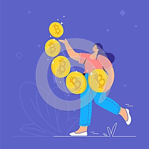 Young woman walking alone and carrying five golden bitcoins