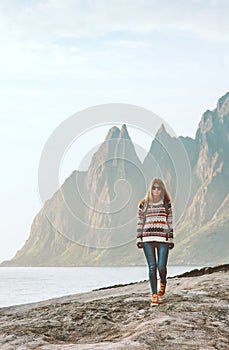 Young Woman walking alone in Norway  traveling solo outdoor