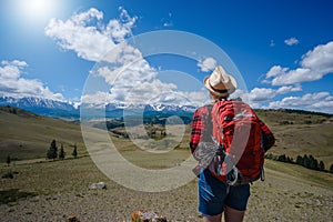 Young woman walking along the in the National Park. Dream, look