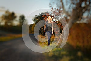 Young woman walking in the countryside