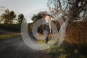 Young woman walking in the countryside