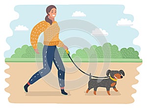 Young woman walking a dog
