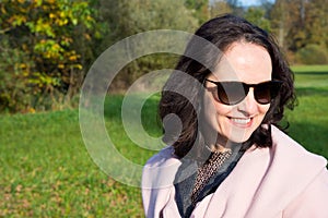 Young woman walking in a park