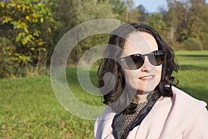 Young woman walking in a park