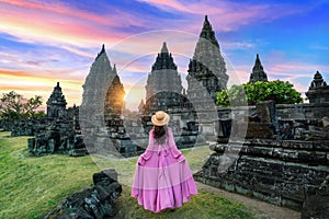 Young woman walking at Prambanan Temple in Yogyakarta, Java, Indonesia