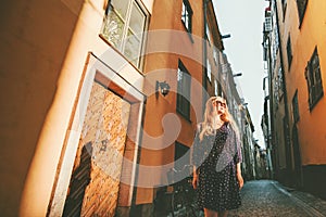 Young woman walking in Stockholm city excursion