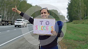 Young Woman Wants to Hitchhike to Success