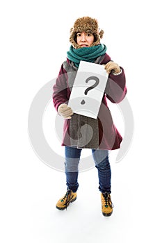 Young woman in warm clothing and showing question mark on white