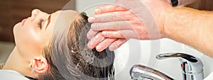 Young woman washing her hair