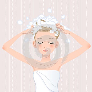 Young woman washing her head with shampoo