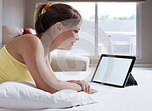 Young Woman Watching Movie On Laptop Computer