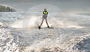 A young woman water skiing.