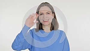 Young Woman Waving Hand to Say Hello on White Background