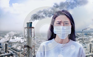 Young  woman wear mask  with air pollution background