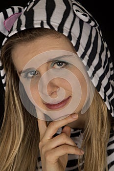 Young woman wearing cat pajamas close-up portrait